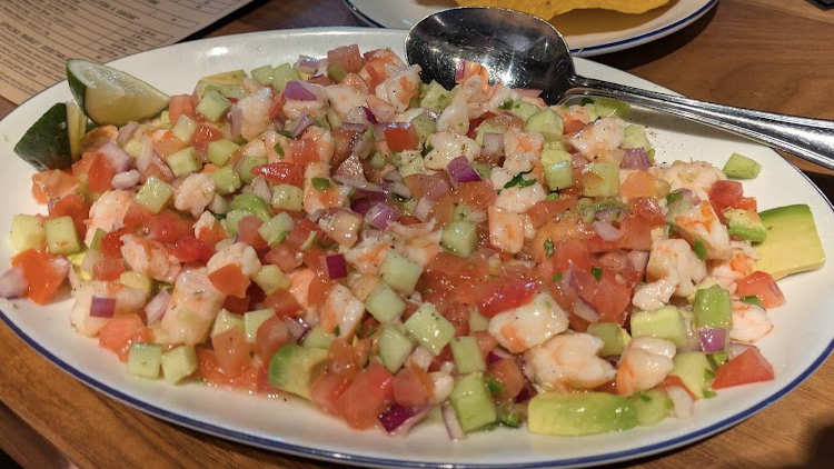Buck and Rider signature dishes Baja Shrimp CevicheHamachi CrudoDeluxe Spicy Tuna Roll